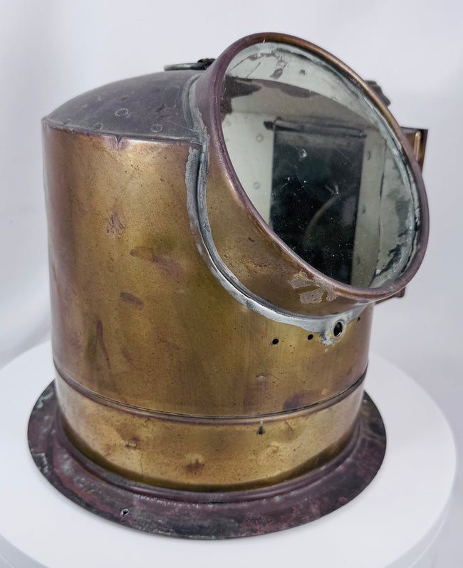 Vintage brass nautical binnacle with integrated illumination chamber for nighttime readings