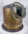 Vintage brass nautical binnacle with integrated illumination chamber for nighttime readings