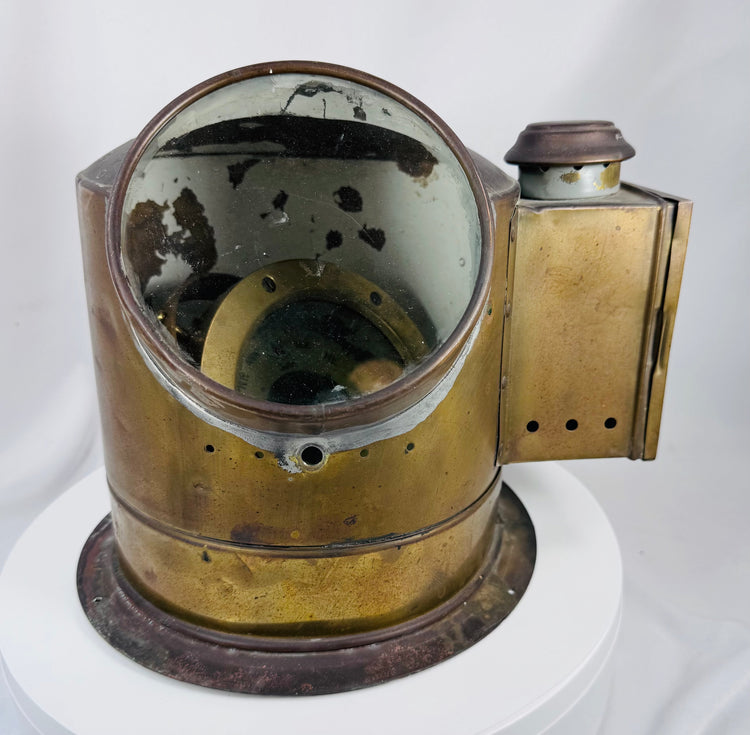 Early 20th century nautical binnacle featuring liquid compass and maritime brass construction