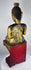 Antique Shan Buddha statue exhibiting devotional wear and historic gilded finish.