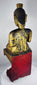 Antique Shan Buddha statue exhibiting devotional wear and historic gilded finish.