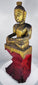 Late 19th century Burmese Shan Buddha with red lacquered plinth and gilded surface.