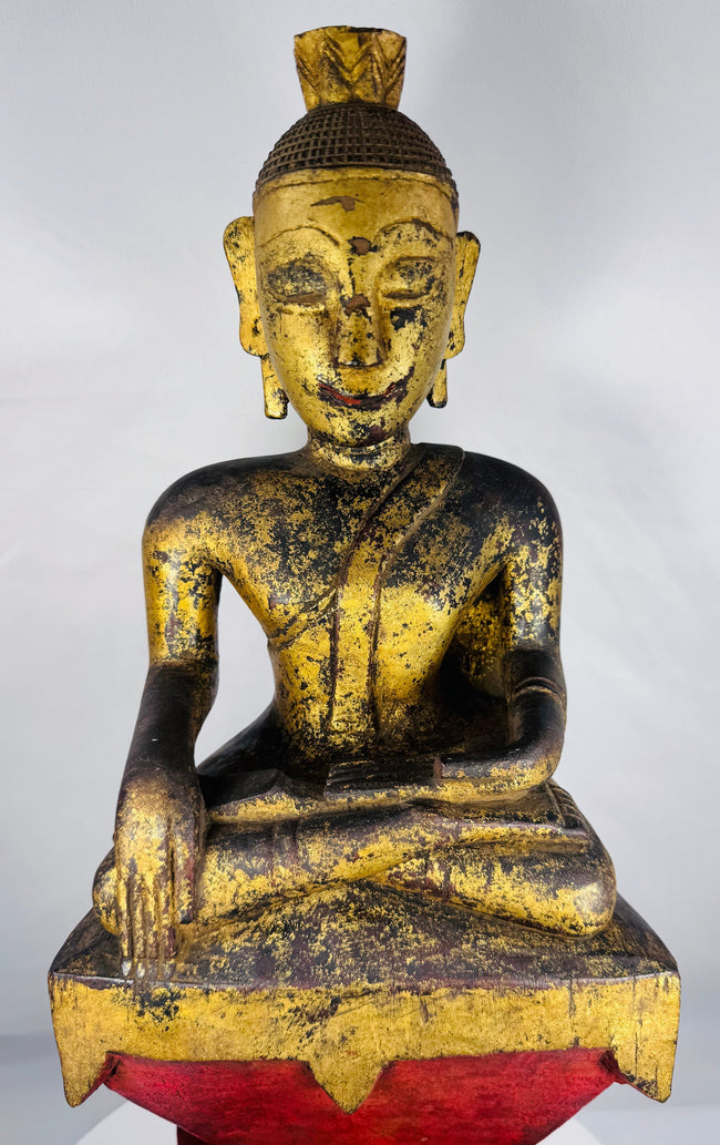 Hand-carved Shan (Tai Yai) seated Buddha from Myanmar with traces of original gilding.