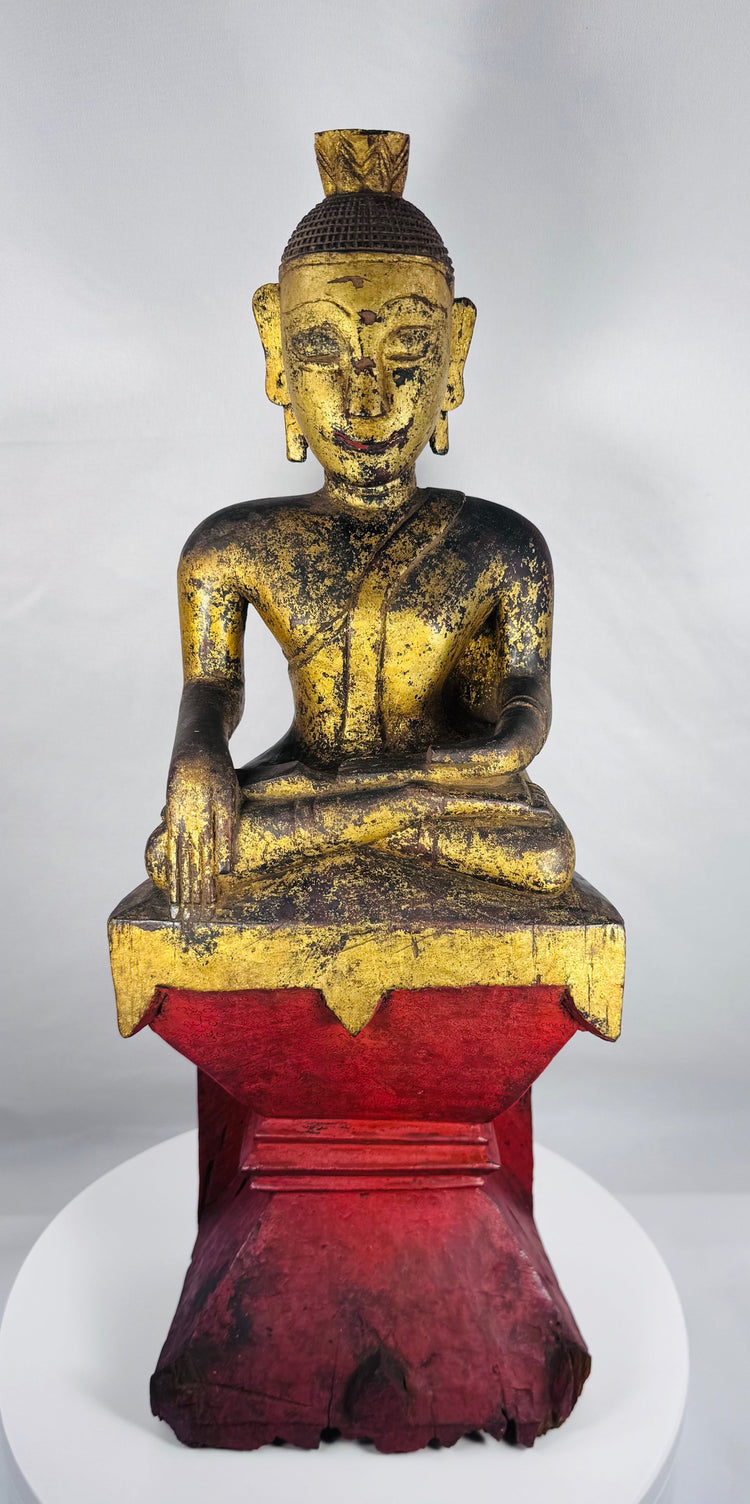 Burmese Shan-style Buddha figure displaying the Earth Witness gesture and aged patina.