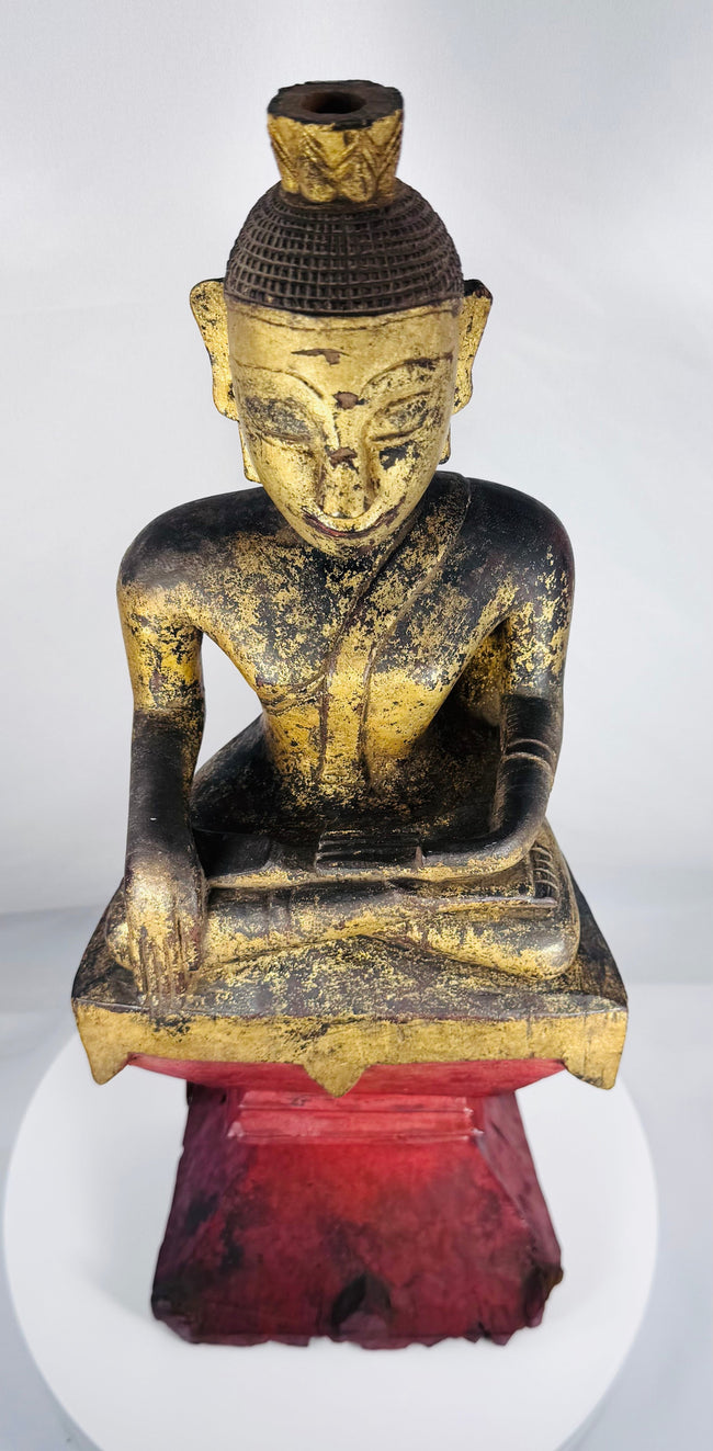 Antique Myanmar Buddha sculpture crafted from hardwood with lacquer and gold decoration.