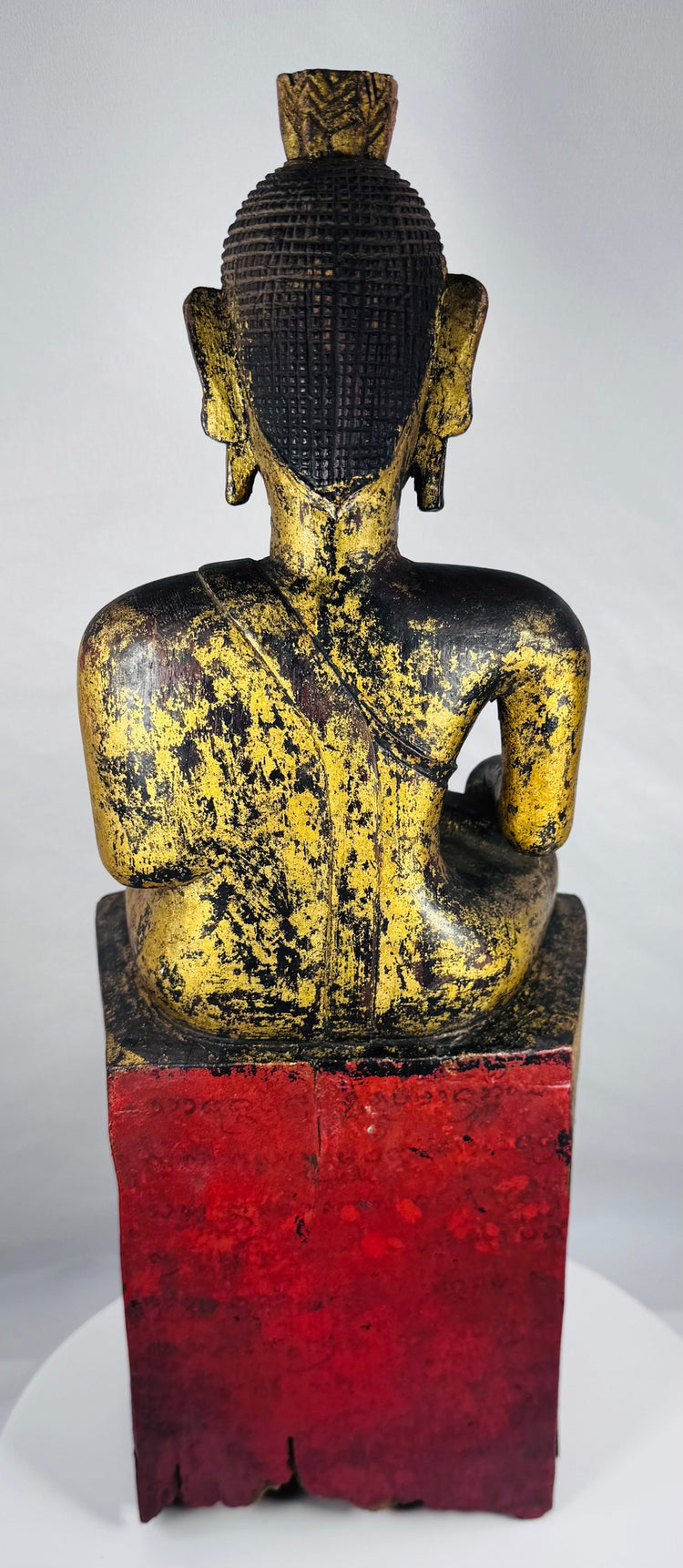 Burmese religious sculpture depicting the Buddha calling the Earth to witness enlightenment.