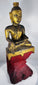 Traditional Shan Buddhist sculpture featuring the sacred Bhumisparsha Mudra gesture.