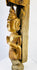 Historic Burmese monastery finial with carved Buddha and architectural detailing