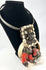 Papua New Guinea ceremonial dance necklace mounted on display stand