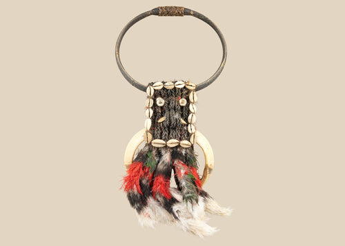 20th century Papua New Guinea tribal ceremonial necklace, braided plant fiber with shell and bone elements, red and black feathers, Oceanic ritual ornament, mounted for display
