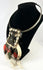 Early 20th-century Oceanic necklace featuring braided plant fiber and bone ornaments