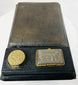 Late 19th century writing slope with aged leather and historic plaque detail