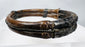 Qing-era bamboo bracelet with raised floral panels and dark aged patina
