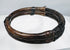 Antique bamboo and silver-alloy bracelet displaying original fittings and surface patina