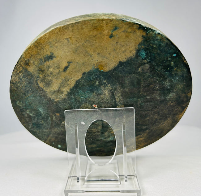 Decorative Chinese bronze mirror with marine creature relief motifs