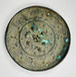 Chinese antique bronze mirror with ornate relief decoration on reverse