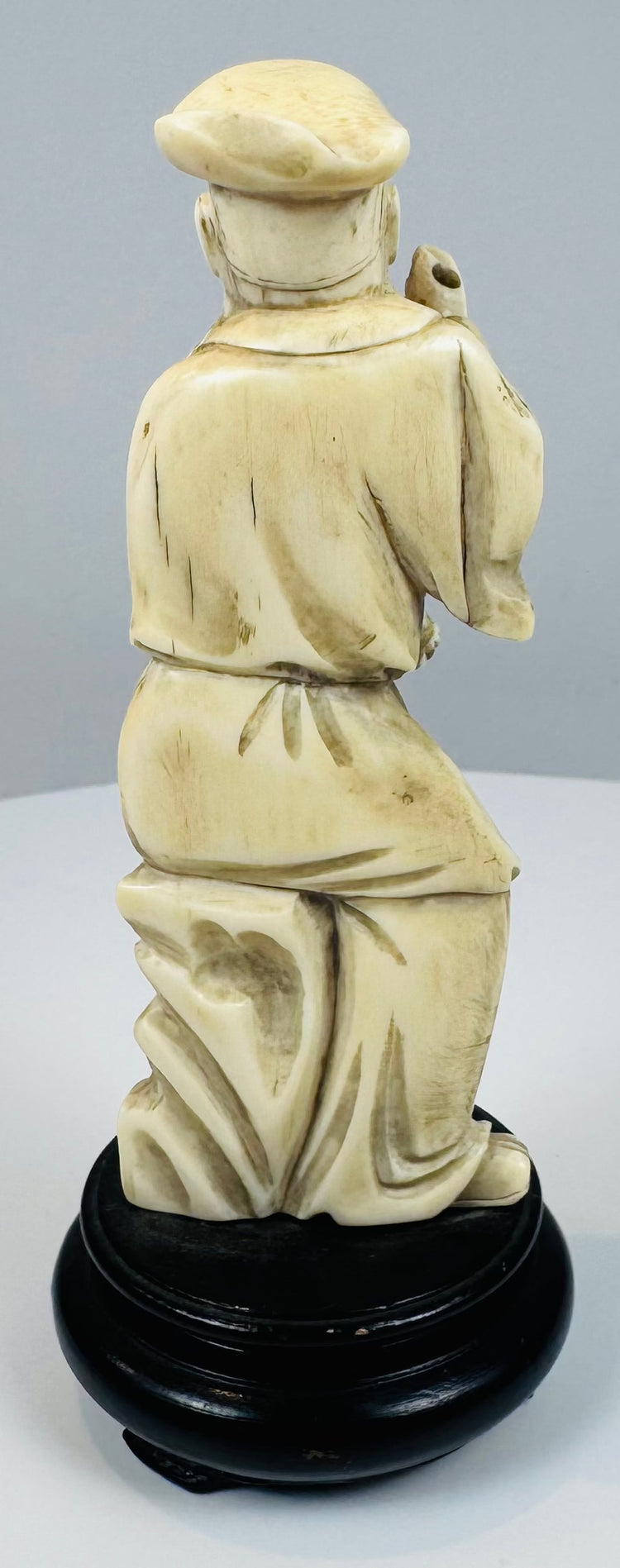 Three-quarter view of the Chinese Daoist immortal Zhang Guolao carving