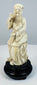 Chinese Zhang Guolao sculpture with incised beard and stained robe details