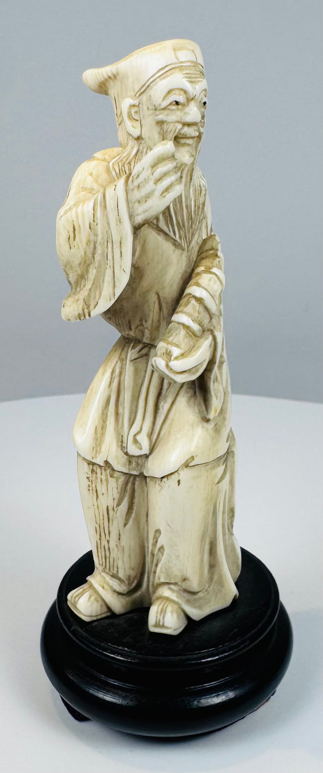 Late Qing to early Republic Chinese figure with aged cream-colored patina