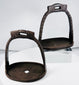 Qing Dynasty Chinese iron stirrups with broad oval footplates and aged patina