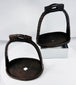 Antique Chinese equestrian stirrups with pierced tread plates and suspension loops