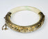 Early 20th-century Chinese hinged bracelet with pale celadon stone and silver setting