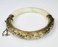 Early 20th-century Chinese hinged bracelet with pale celadon stone and silver setting