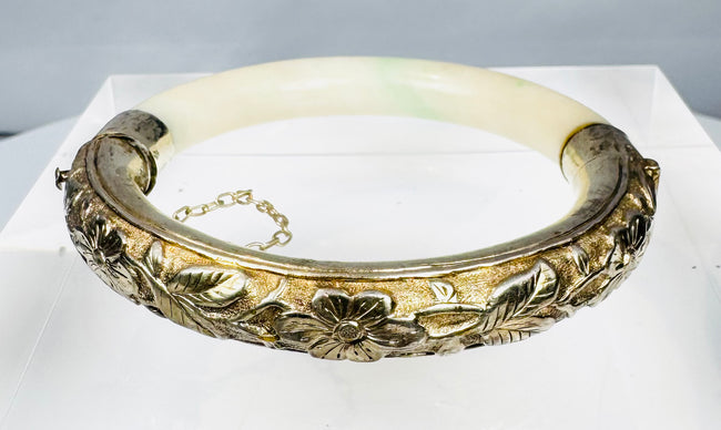 Chinese silver and jade bracelet with floral relief decoration and hinged clasp