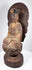 Antique Chinese devotional sculpture of Guanyin seated upon a carved lotus pedestal with aged lacquer and gilt decoration