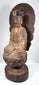 Antique Chinese devotional sculpture of Guanyin seated upon a carved lotus pedestal with aged lacquer and gilt decoration