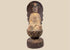 Antique Chinese Guanyin statue from the Late Ming to Early Qing Dynasty with giltwood surface, red pigment and carved lotus pedestal