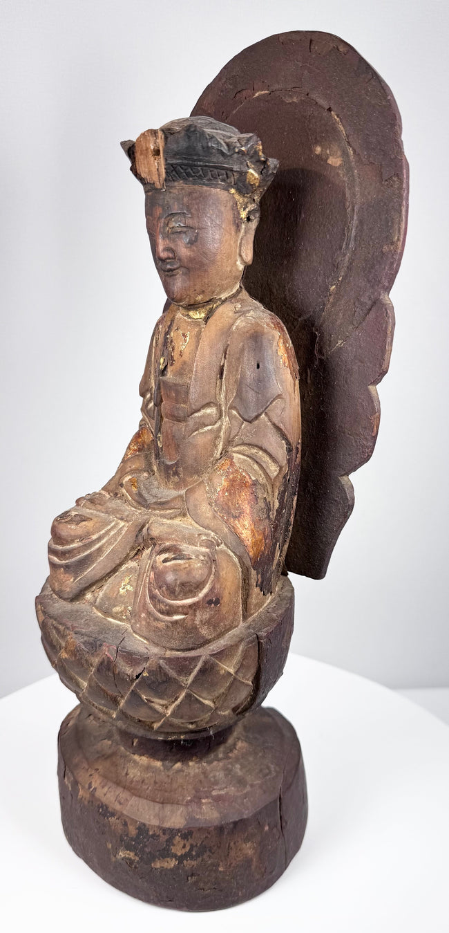 Late Ming to Early Qing Guanyin with layered robes, meditative posture and extensive historic devotional patina
