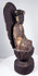 Carved lotus throne beneath antique Chinese Guanyin with overlapping petals and remnants of historic polychrome finish