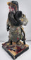 Antique polychrome Guan Gong sculpture with cloud, flame, and scale motifs