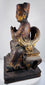 Opposite side view of Qing Dynasty ancestor figure displaying horseshoe-back throne, openwork platform and aged lacquer