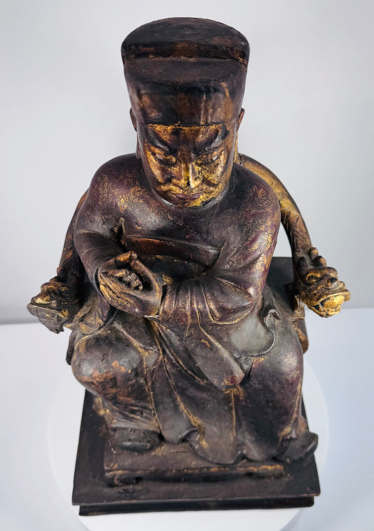 Detail of underside and base of Qing Dynasty wooden figure showing reinforcement blocks, old repairs and age-related cracking