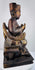Rear view of antique Chinese Qing Dynasty wooden ancestor figure showing carved throne construction and aged surface