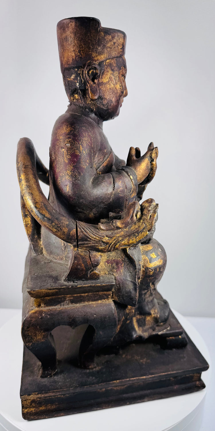 Rear view of antique Chinese Qing Dynasty wooden ancestor figure showing carved throne construction and aged surface