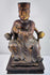 Front view of 19th-century Chinese carved wood civil official figure wearing formal robes and a tall square court cap