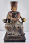 Front view of 19th-century Chinese carved wood civil official figure wearing formal robes and a tall square court cap