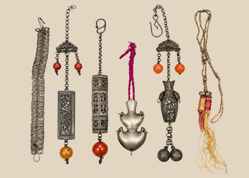 Antique Chinese chatelaine and personal ornament collection with beads, bells, amulet cases and textile tassel