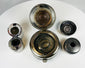 Antique compact writing kit with ink pots showing patina and use wear