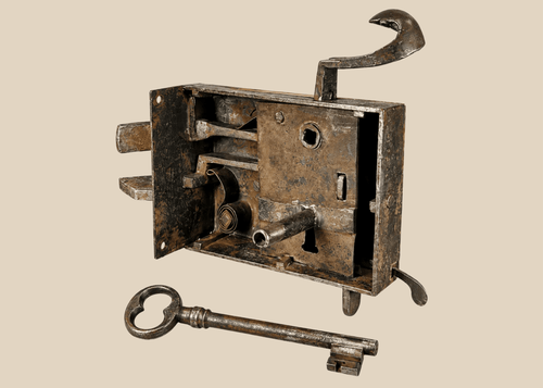 Antique iron door lock mechanism with visible internal bolts and large key