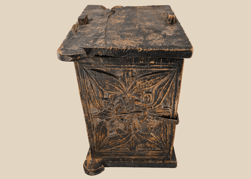 Antique South Asian carved wooden chest with floral panel and iron latc