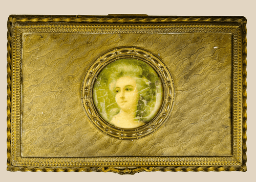 Antique gold decorative box featuring a painted portrait miniature of a woman displayed on a beige background.