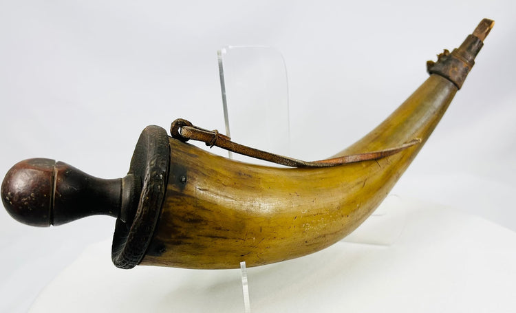 Early firearms era black powder horn with turned wooden plug and aged strap fittings