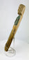 Side view of antique European wooden folk art sculpture with natural wear and patina.