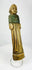 European devotional wooden sculpture displayed on neutral background, showing carving quality.