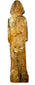 Antique hand-carved wooden figurine back view with green pigment traces and wood grain