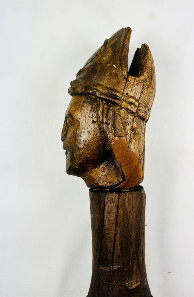 18th–19th century carved wooden pestle with human face and functional mortar